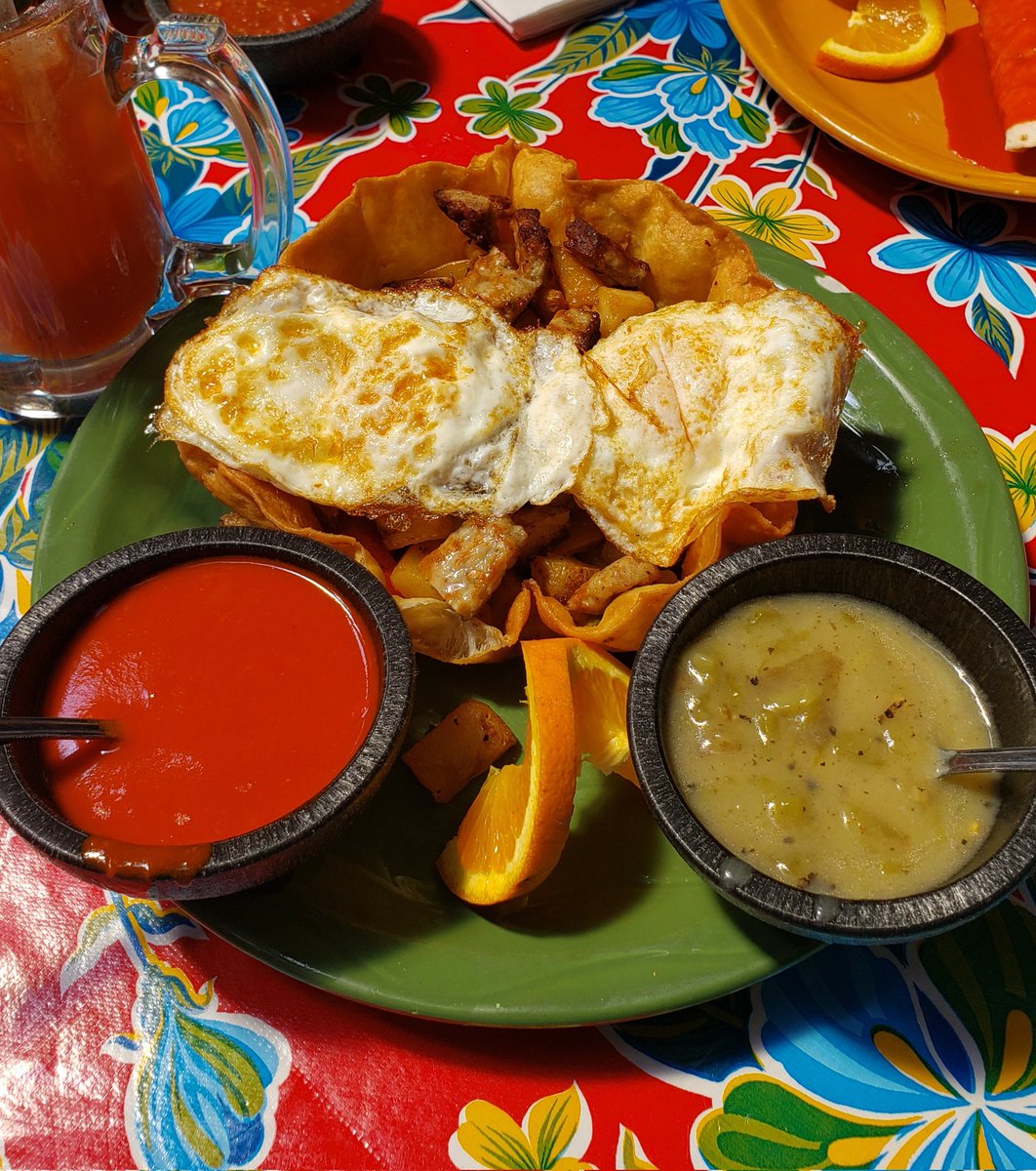 Yesterday's breakfast tostada compuesta with a side of bloody mary. Red and green baby 😋