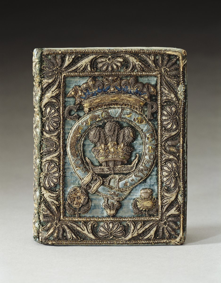 Book of Common Prayer (1638) bound for Charles II when Prince of Wales. Embroidered design in silver thread on blue velvet, with the Prince of Wales feathers to centre within Garter badge, with crown above between initials C.P (Royal Collection Trust, HM CIII)