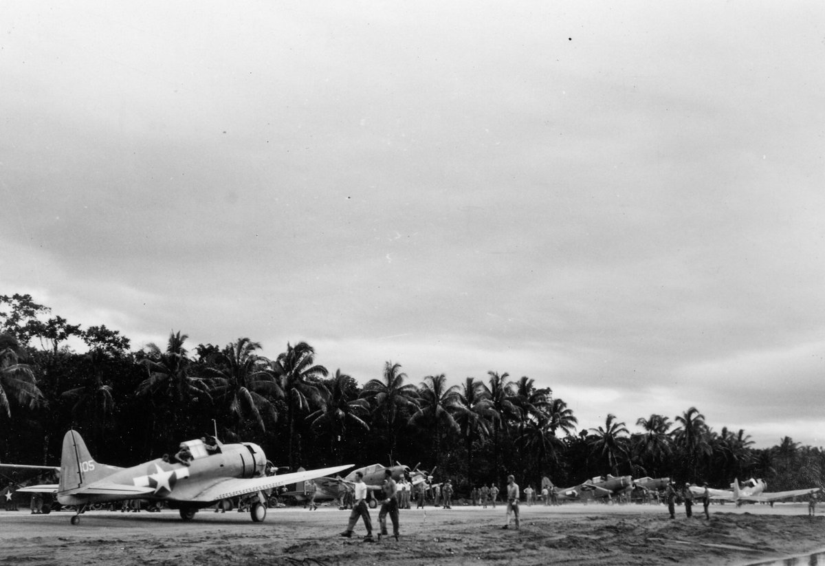 Marine SBD Dauntless dive bombers on Bougainville in the Northern Solomons, late '43.

The SBD stayed in front line service long after technological developments rendered it obsolete. Though it couldn't carry the bomb load its erstwhile replacement, the SB2C Helldiver, could, it…