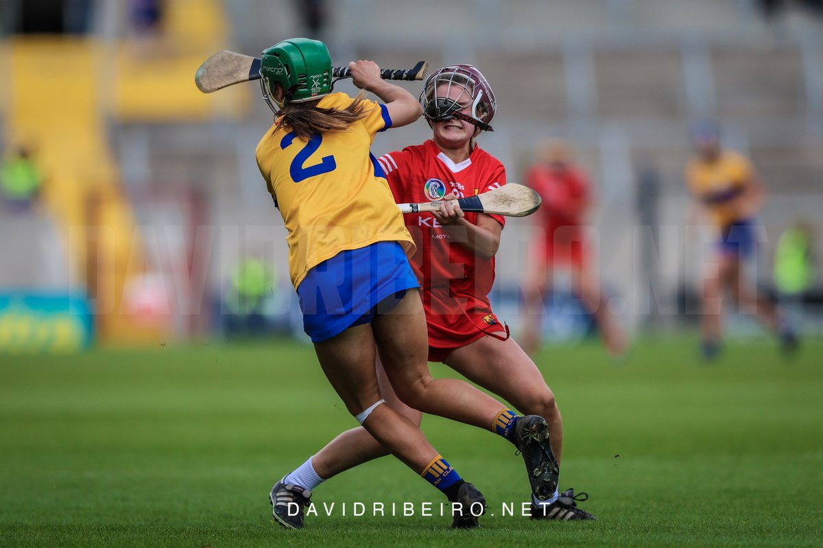 Susan Daly of Clare goes past Clare Mullins of Cork during today's Munster Championship at SuperValu Páirc Uí Chaoimh. It finished Cork 1-17 (20) - Clare 1-09 (12). See more pictures from the match on the website: davidribeiro.net/camogie-county…