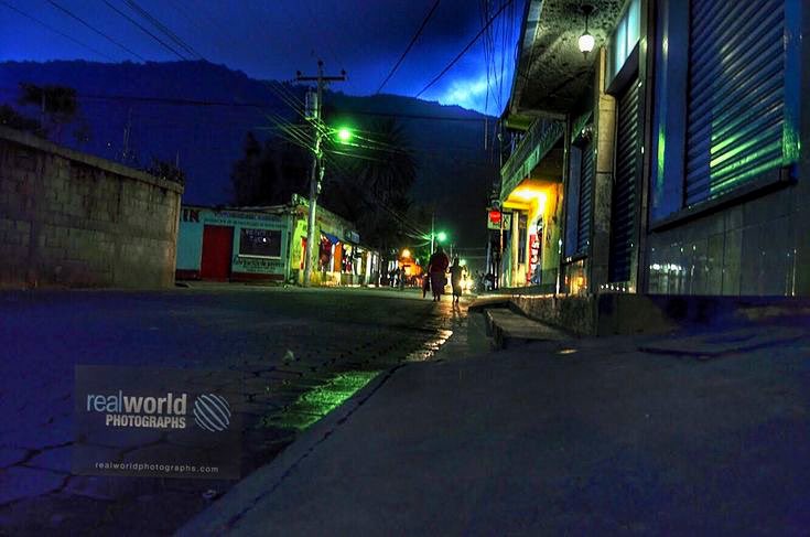 Darkness descends over a quiet street in Panajachel, Guatemala, Central America. Gary Moore photo. Real World Photographs. #photojournalism #world #streets #night #guatemala #centralamerica #sweden #malmo #photography #garymoorephotography #denmark #realworldphotographs #nikon