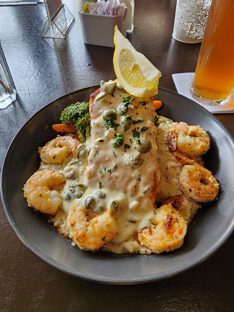 Trying out the local cuisine here. Tried their local brewer's ale: Dead Elephant. Its an IPA. Not overtly bitter. Rather refreshing. Was actually surprised about their app: Lemongrass shrimp. And their Salmon piccata with shrimp and lobster.
