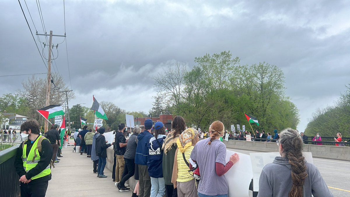 Hundreds of pro-Palestine protesters call for a ceasefire outside of the Courtyard by Marriott as U.S. House Speaker Mike Johnson and U.S. Rep. Mariannette Miller-Meeks, R-Iowa, host a fundraiser inside.