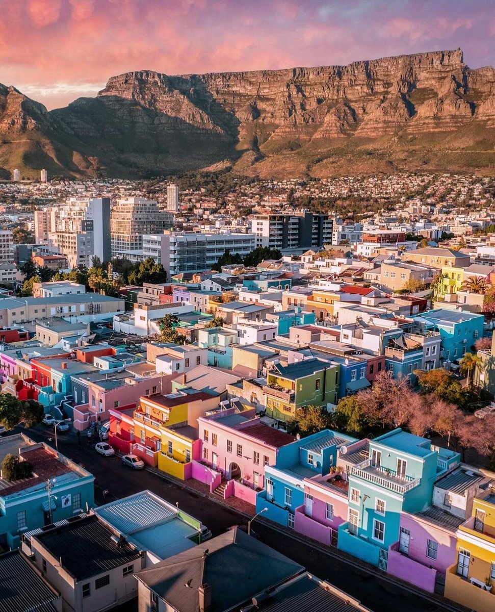 Bo-Kaap is a vibrant neighborhood in Cape Town, South Africa 🇿🇦, known  for its colorful houses, rich history, Cape Malay culture, cobblestone  streets, and stunning views of Table Mountain. #ThisIsAfrica #VisitAfrica, image size:971x1200