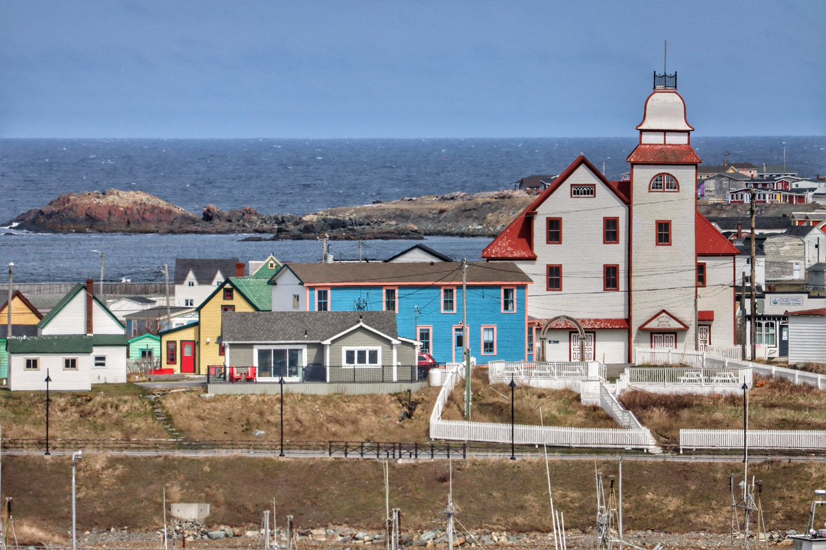 Fences and lots of colours with an ocean backdrop. Sunday morning in Bonavista, NL.