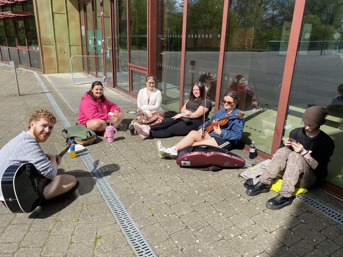 On campus in the University of Limerick today doing our Make It Up As You Go Along stage show to 150 lovely children! On the way back to the bus I spotted this little group of students sitting on the sunshine playing music. Who wouldn’t want to study here?