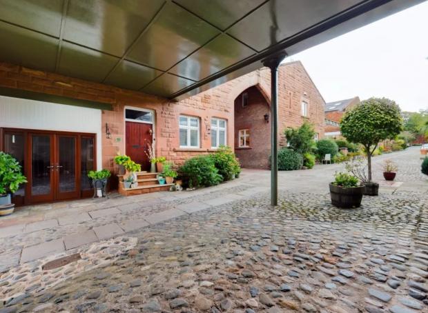 This four-bedroom barn conversion in Thurstaston is described as 'characterful and impressive' - but where is it? wirralglobe.co.uk/news/24278736.…