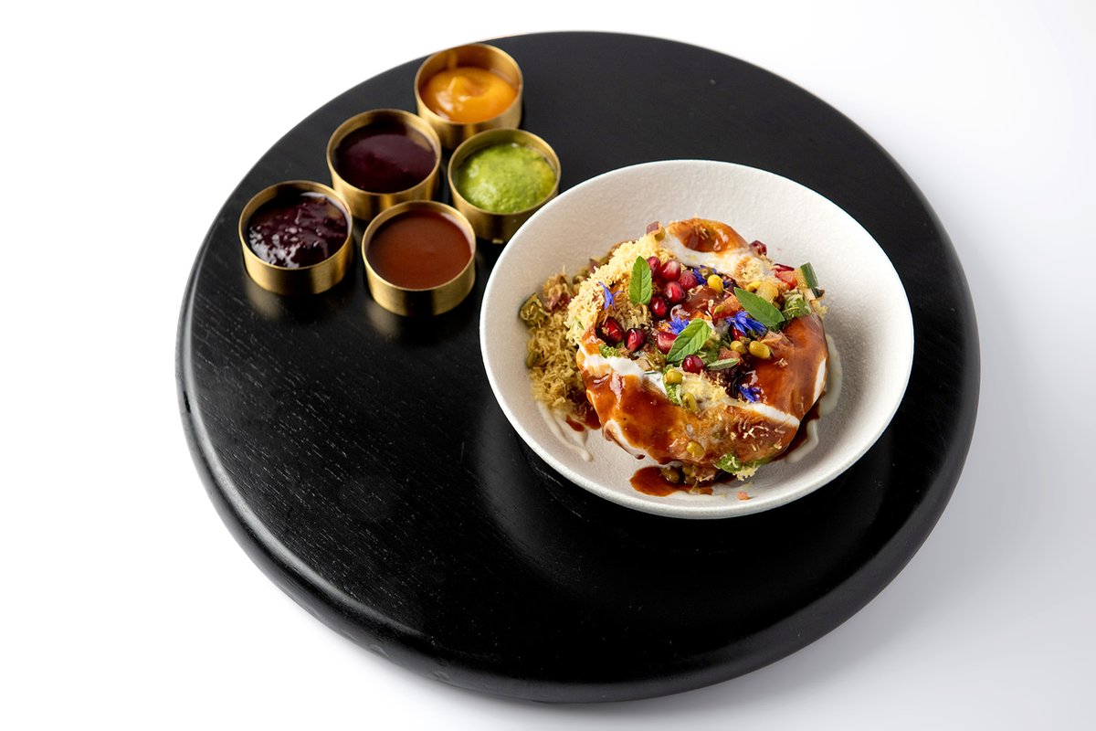 Start your Kanishka experience with raj kachori 💚 Wheat bubble, smoked yellow peas and potato, mung beans, and signature chutneys result in a traditional dish whose texture and flavour is given a sophisticated spin on the plate 🍽️

#londonrestaurant #indianrestaurant #starters