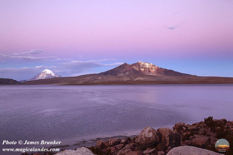 Pastel colours at #sunset over Laguna Chungará in #Lauca Nat Park #Chile for #SundaySunsets, available as #prints and on gifts here: james-brunker.pixels.com/featured/lake-… #AYearForArt #BuyIntoArt #SunsetSunday #sunsetphotography #landscape #minimalist #minimalism #lakes #mountains #pinksky