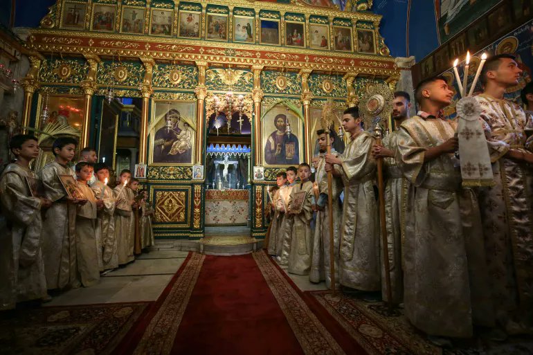 In defiance of the Israeli genocide, Palestinian Christians hold Palm Sunday mass at the Greek Orthodox Saint Porphyrius Church in Gaza City.