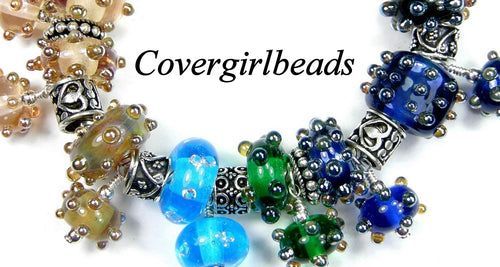 Love making jewelry?  Get some of these beautiful handmade lampwork beads for your next jewelry making project covergirlbeads.com #LampworkBeads #LargeHoleBeads #JewelryMakingBeads #JewelryBeads #JewelrySupplies #EarringBeads #Jewelry @Covergirlbeads