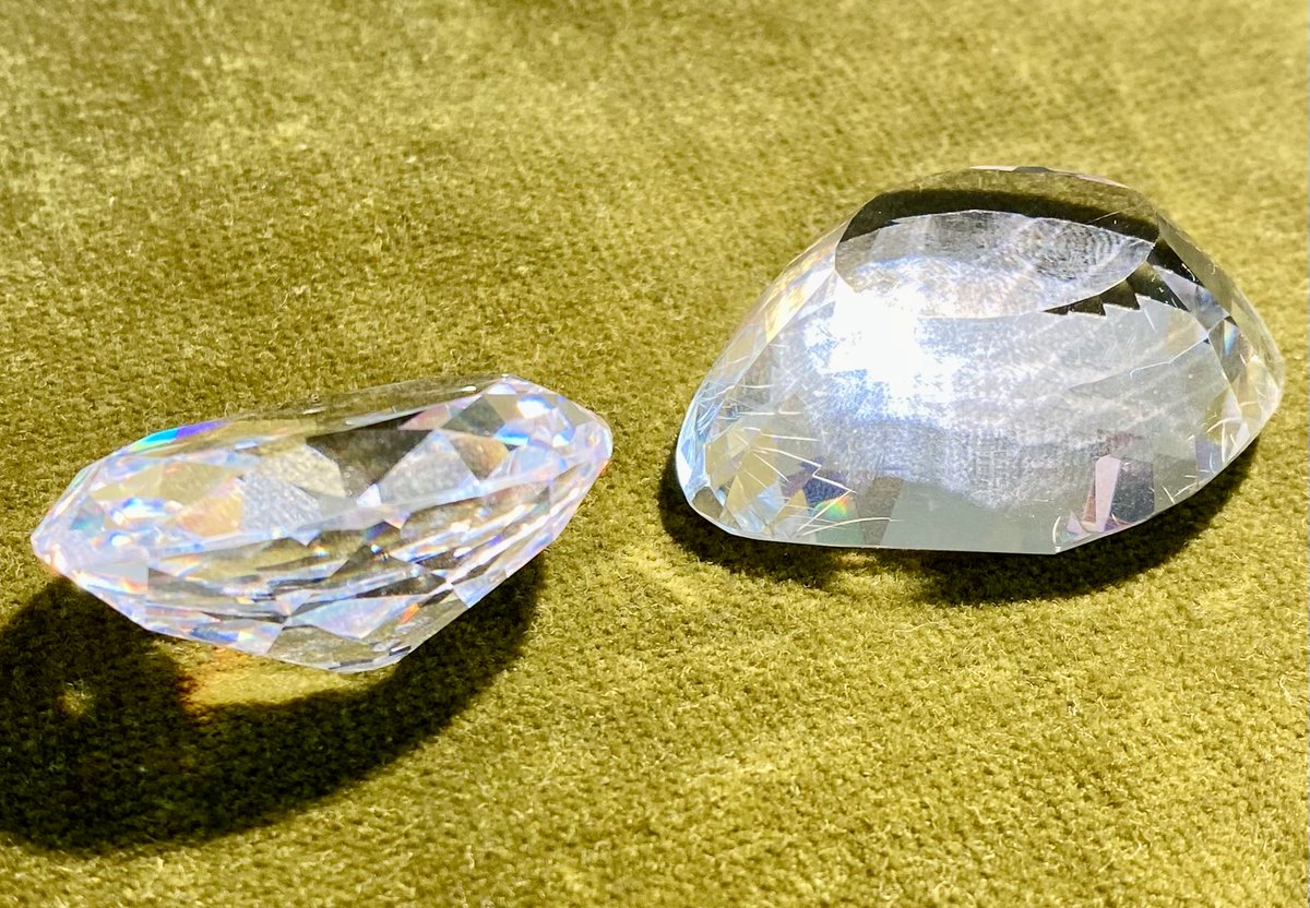 Models of the famous Indian diamond known as the Koh-I-Noor. (See Wiki) On the right before recutting it weighed 191 cts and on the left, after recutting in 1851, it weighed 105 cts. The model on the left is reproduced by courtesy of Lewis Walduck