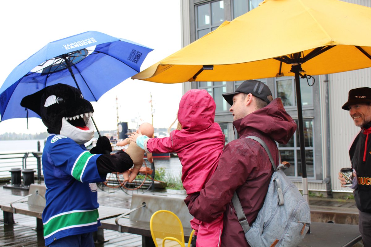 It was a rainy morning in North Vancouver this morning, but we still had a great time spreading game day excitement at the Shipyards! 🚢 Stay tuned to @canucksfin on IG every game day to see where Fin is for Find Fin, presented by @td_canada 💚