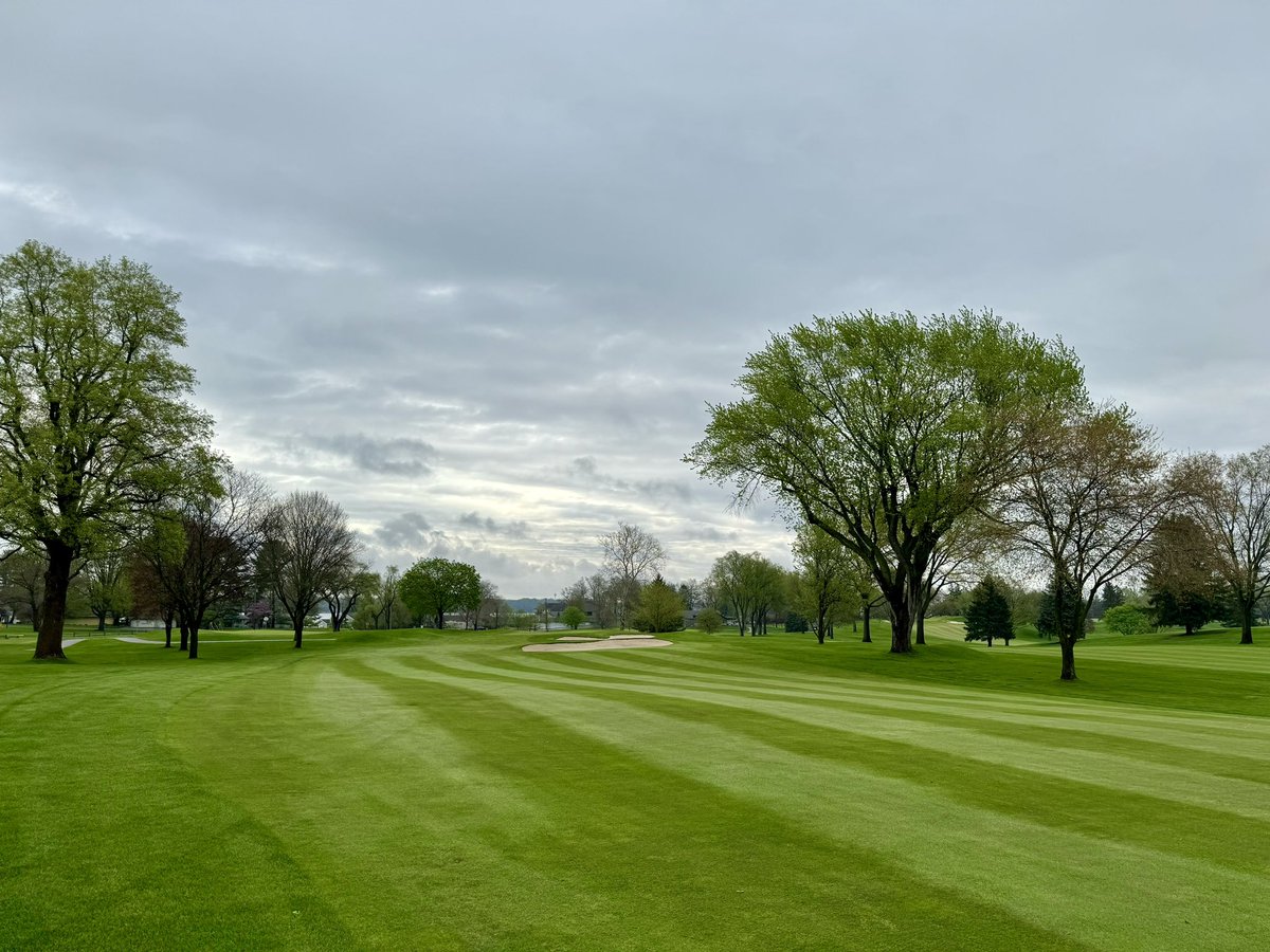 Challenging morning with a quick inch of rain while we completed morning course setup! Thankful for a great TEAM and this beautiful property! Course is GTG for a warm and humid April 80 degree day and buggies are 👌 #GLCC #GullLakeCC #12 #MorningView