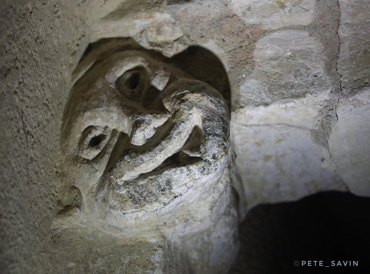 A mischievous face looking out at those fleeting lives down the centuries who visited the church of St James in Avebury