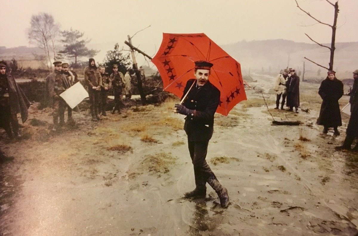 Paul McCartney with umbrella during filming of the Pipes of Peace music video, December 1983