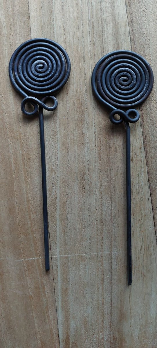 A couple of hand forged Iron Age hair pins made earlier, copied from original ones. Just need a brush over and the tips sharpening then good to go. Both just over 5 inches long. #IronAge #Celtic #Prehistory
