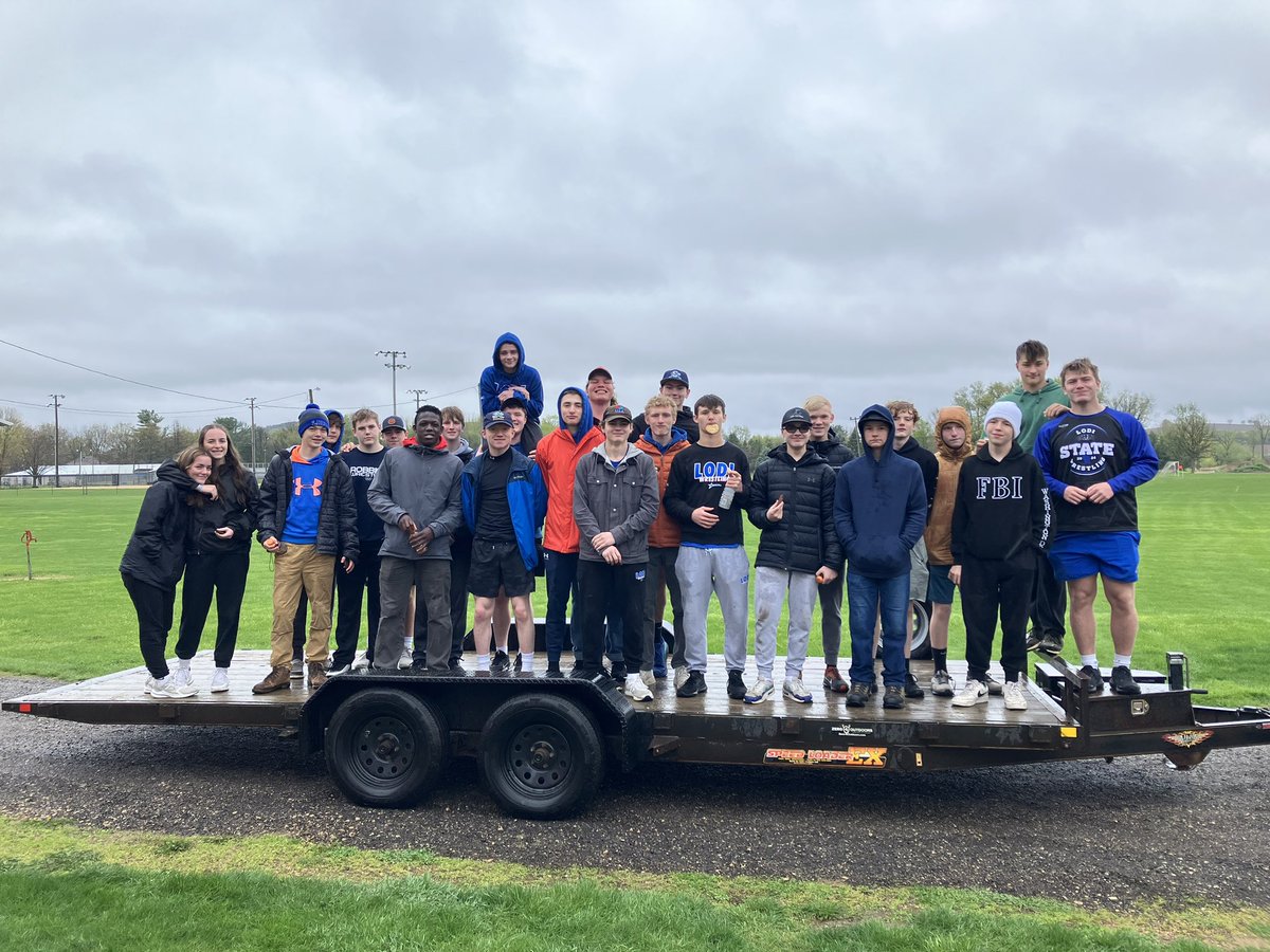 Thank you to these Lodi Wrestlers as well as the coaches who came out today, endured the rain, and put out Park Benches for the Lodi Community. #BleedBlue #DoToughThings