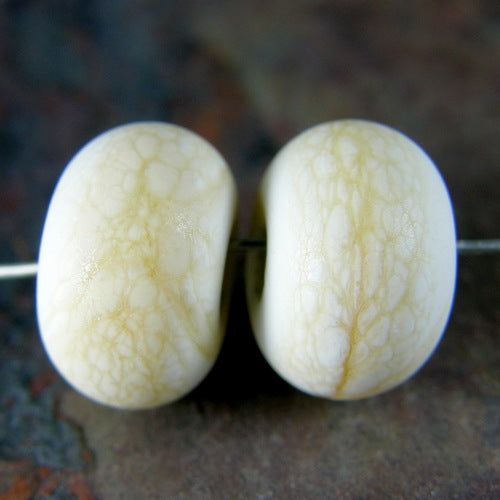 Light ivory handmade lampwork glass beads with a matte bead finish bit.ly/IvoryBeads264e…  via @Covergirlbeads #ShopSmall  #HandmadeLampworkBeads #LampworkGlassBeads #LampworkBeads #HandmadeBeads #JewelryMakingBeads #JewelryBeads #JewelrySupplies #ShopSmall #SmallBusiness