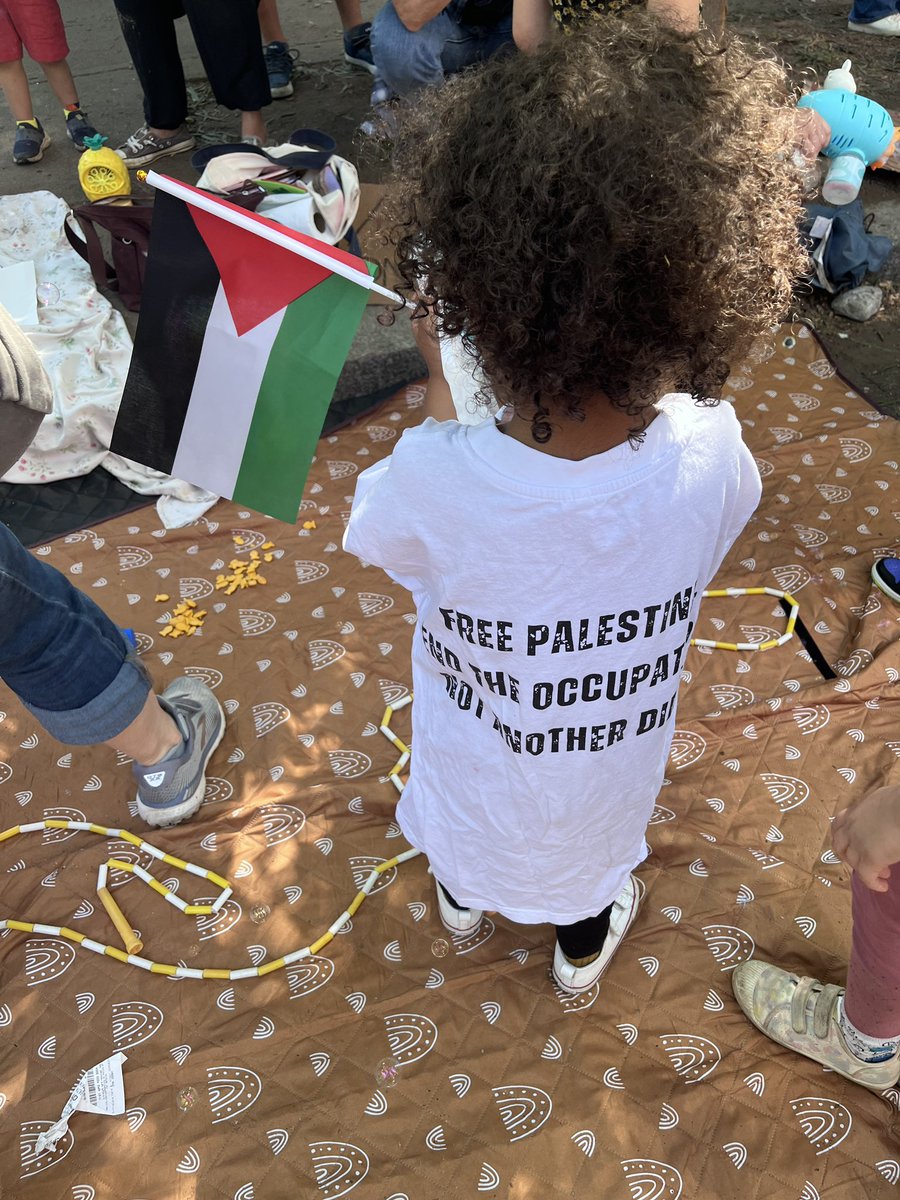 Big mood from our three year old today at the GWU encampment with the DC Families for Ceasefire crew, wearing their Black for Ceasefire shirt. The kids are in solidarity with student organizers and most of all, in solidarity with the children (and all people) of Palestine! 🇵🇸