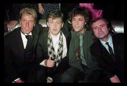 Roger Daltrey, Paul McCartney, Bob Geldof and Phil Collins are photographed during the American Music Awards in January 1986.