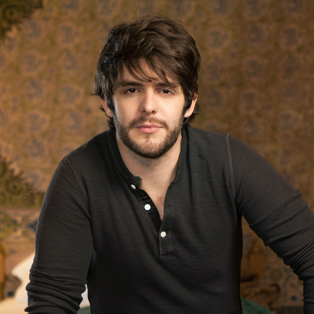 Playing right now is T-ShirtKickin' Country by @ThomasRhett
