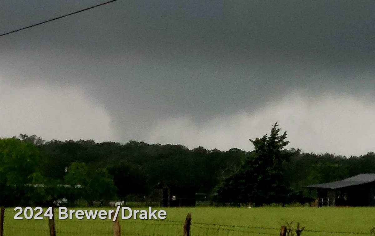 Massive multivortex tornado 7 miles SSW of Madisonville Texas at 6:43 pm cDT 28 April 2024 @NWSFortWorth W/ @JustonStrmRider