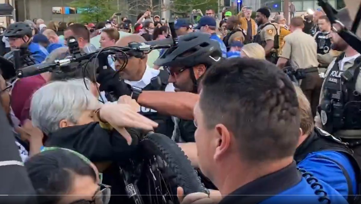 🚨 FASCISM UPDATE: Jill Stein charged with assault after cops attack and arrest her.

Three large cops seen here shoving a bike into 73-year-old Jill Stein. They then threw her backwards onto her head and arrested her.

Shame on Biden and the media for pretending this is OK.