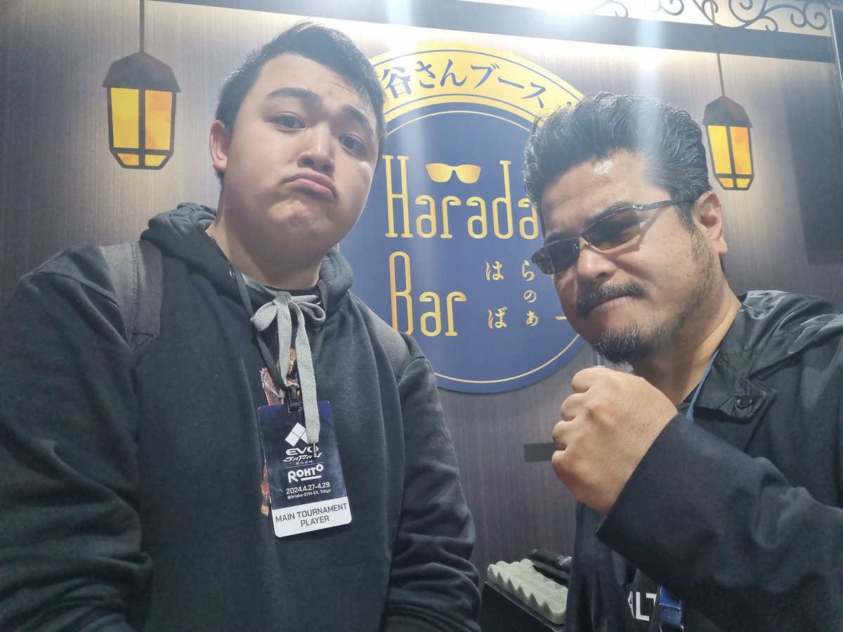 I asked Harada for a picture. He said 'sure' and we took one. Afterwards he said 'VOILA' and did Lili's qcf3 on me irl. I was jumping at the time so it tornado'd me and he was able to convert into a full combo. He then started doing Devil Jin's u4 and flew around the venue 😓