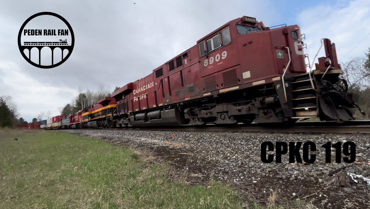 CPKC 119 NB passing mile 86 MacTier Subdivision with leaders CP 8909, KCSM 4571, CP 6231, CMQ 9020 midway CP 9735 at 09:42 April 28, 2024 #PEDENRAILFAN
