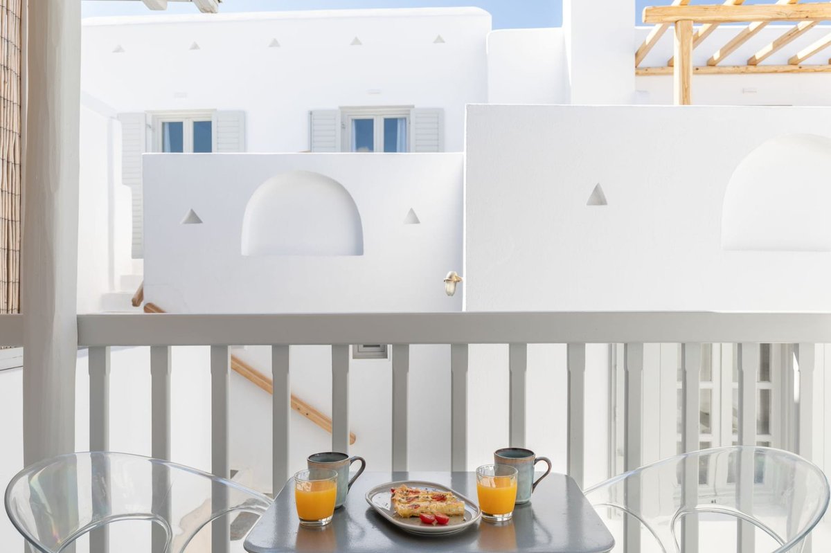 Enjoy a delicious breakfast spread against the backdrop of our serene white walls.  Your dream vacation awaits. 🥐🌞 

Plan your stay at elenamykonos.com

#elenahotel #hotel #design 
#greekislands #greece  #mykonos
#ElenaHotelMykonos #BreakfastBliss #BookYourStay