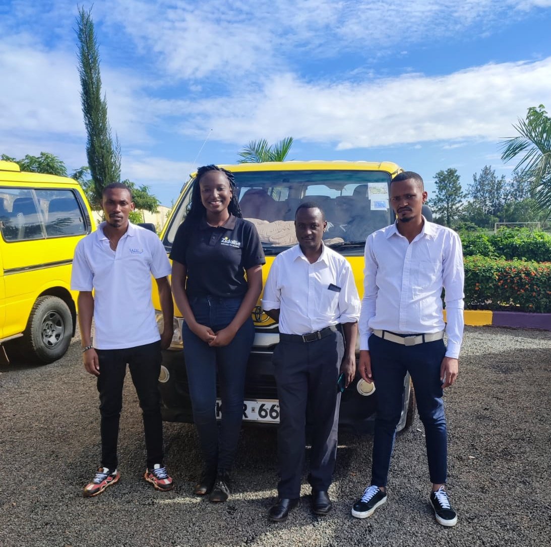 Rumor has it that school dates changed unexpectedly, yesterday midnight.
Unfortunately, we missed the memo!😅
 We arrived at work ready for school transport, only to find out there are no pupils yet. 

Meet me and some of the amazing @zidallie drivers. #schooltransport #zidallie