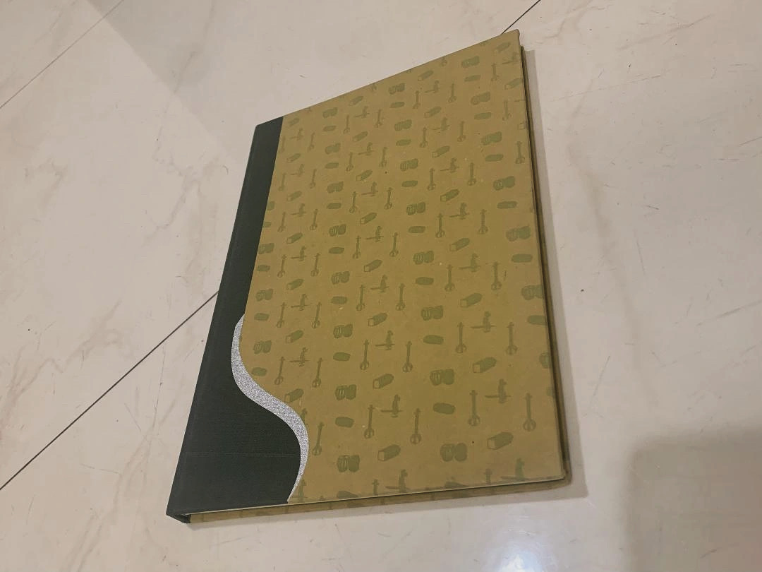 Tanpura Journal - A4, Brown Exclusively designed A4 size journal with tanpura motif. Contains ruled pages and a hard cover made of handmade paper. Copyright: Underscore Records Pvt. Ltd. …derscorerecordspvtltd.myinstamojo.com/product/468391…