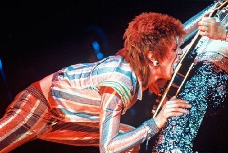 David Bowie & Mick Ronson at London's Hammersmith Odeon, 1973.  Photo by Ilpo Musto.