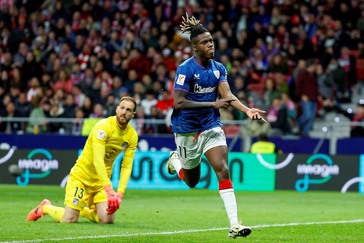 Nico Williams of Bilbao points to his skin after scoring against Atletico Madrid on Saturday.