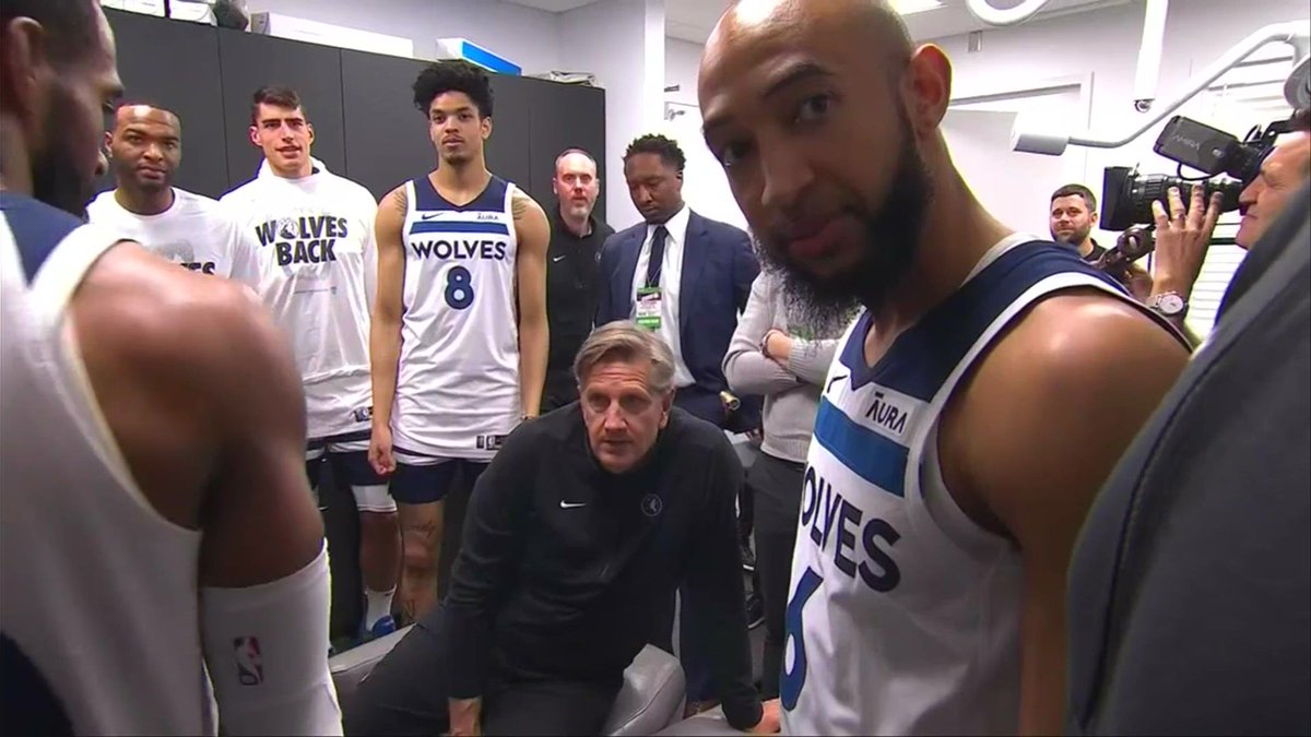 cjzero's tweet photo. Entire Wolves team around Chris Finch in the medical room https://t.co/TWqdoqnVwz