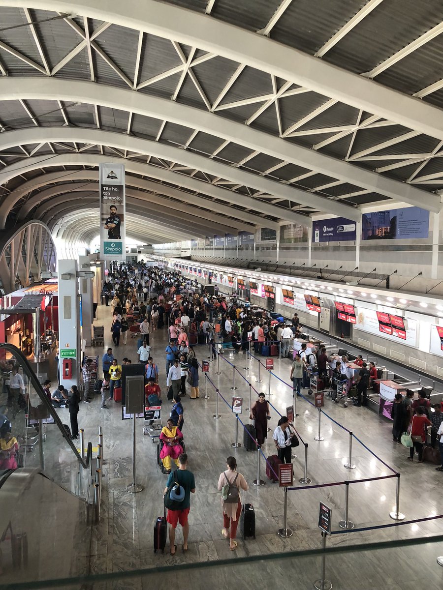 We Bangaloreans are thoroughly spoilt, potholes notwithstanding. Both our terminals are world class. 
I felt I was back in the Dark Ages at T1 Mumbai Airport.
Scenes of chaos from the entry point. <a href="/AAI_Official/">Airports Authority of India</a> Don’t you think domestic travelers need basic comforts?