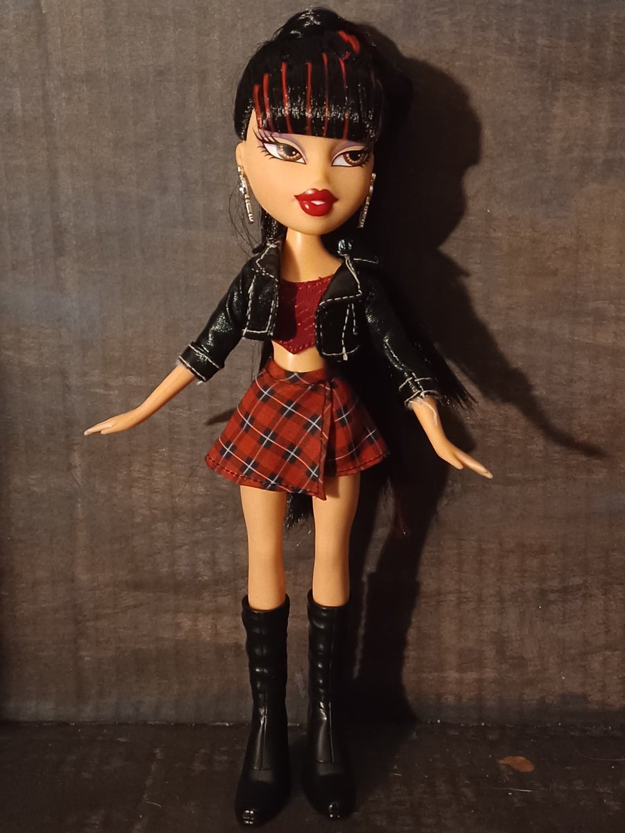 Tiana in a Snapstars skirt and jacket! She honestly looks so good in just black and red!🖤❤️ #bratztiana #bratzdoll #bratzdolls #mga #bratz #dolls #dollphotography #restyle #dollrestyle