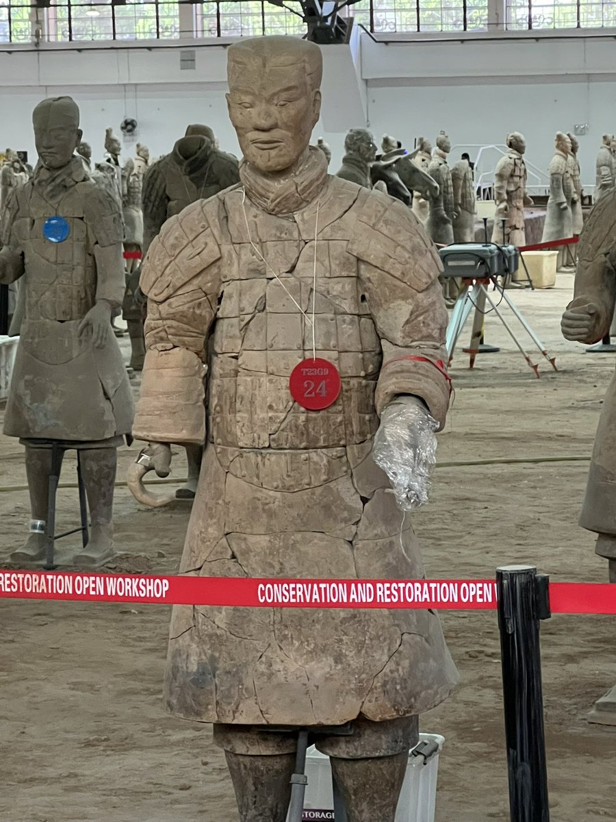 Terracotta Army. 2200 yrs old, 8K soldiers. Each figure had unique individual facial features and held real weapons. Detail is evident in sole of the shoe and braided hair of this kneeling warrior. Originally brightly colored, most of the paint dissolved shortly after excavation