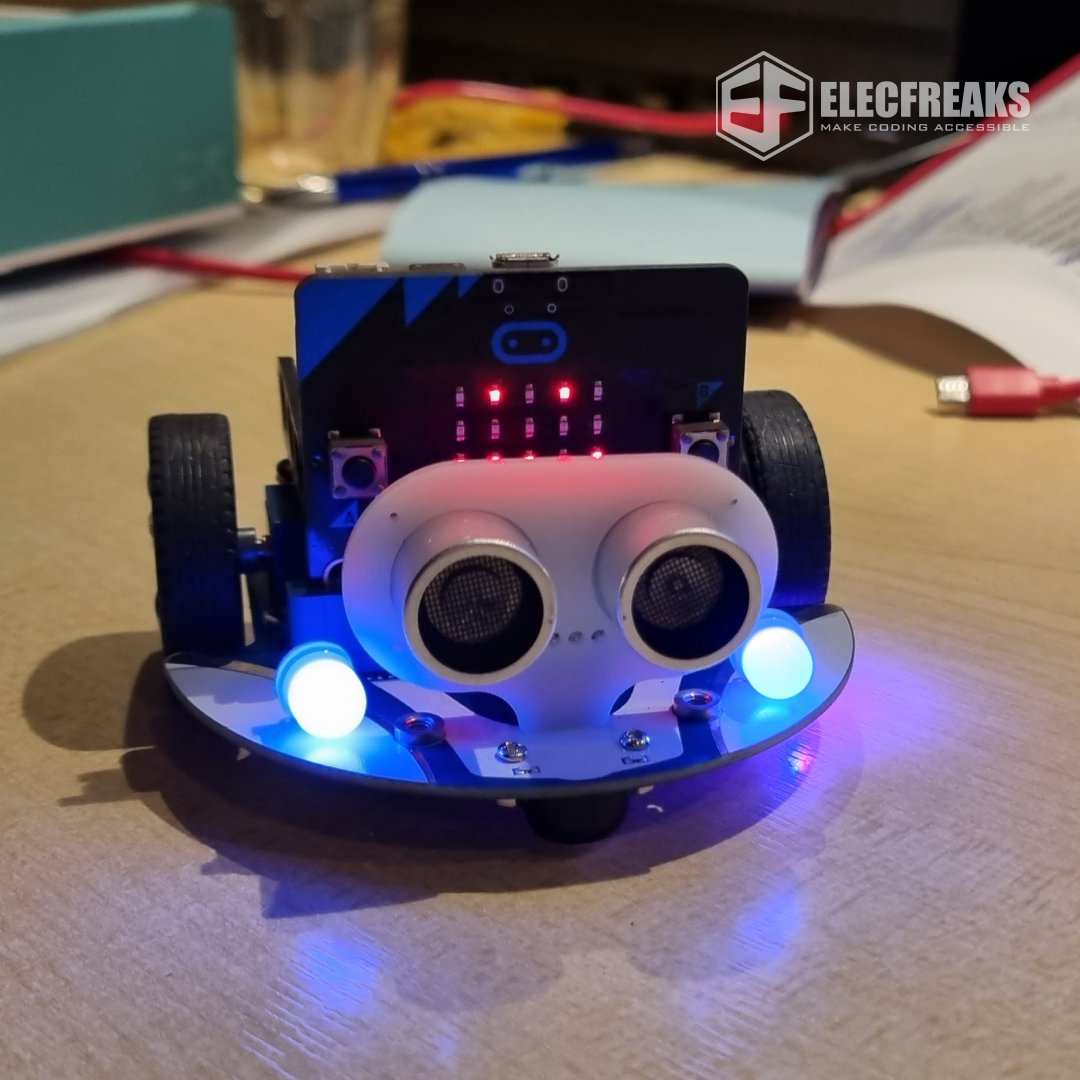 🚗 Introducing the ELECFREAKS Cutebot! 🤖 This adorable rear-drive smart car is powered by dual high-speed motors, ready to zip around with style and smarts! 🌟 Equipped with ultrasonic and distance sensors, two RGB LED headlights, clearance lamps, line-tracking probes, and an…