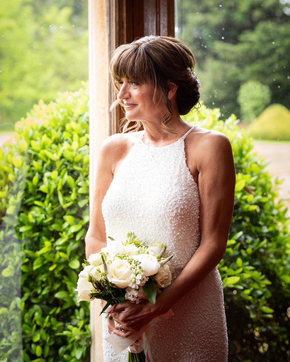 Carmen looking radiant whilst backlit mid ceremony at @ManorbytheLake. See more - lewesweddingphotographer.com/carmen-jeff-we…