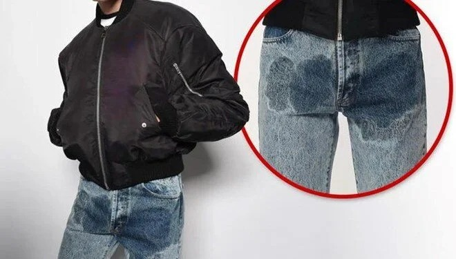 Milano Moda Haftası'nda tanıtılan 'idrar lekeli' görünümlü kot pantolonlar, 608 dolardan rekor sayıda satılıyor.