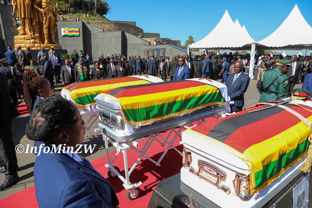 Nick Mangwana (@nickmangwana) on Twitter photo His Excellency President Emmerson Dambudzo Mnangagwa <a href="/edmnangagwa/">President of Zimbabwe</a> and First Lady Dr Auxillia Mnangagwa <a href="/ZimFirstLady/">First Lady of Zimbabwe 🇿🇼</a> have arrived at the National Heroes Acre ahead of the triple burial of late Brigadier General Shadreck Vezha, Cde Tsitsi Jadagu and Cde Nyasha Nash Dzimiri. His Excellency President Emmerson Dambudzo Mnangagwa <a href="/edmnangagwa/">President of Zimbabwe</a> and First Lady Dr Auxillia Mnangagwa <a href="/ZimFirstLady/">First Lady of Zimbabwe 🇿🇼</a> have arrived at the National Heroes Acre ahead of the triple burial of late Brigadier General Shadreck Vezha, Cde Tsitsi Jadagu and Cde Nyasha Nash Dzimiri.