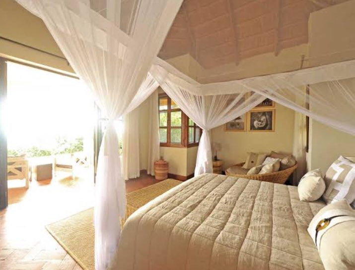 #ElephantPlains Lodge in Uganda offers #luxurious safari accommodations with stunning landscape views, a cozy fireplace, and a #beautiful garden. Guests can relax by the pool or deck, To get stress-free, unforgettable experience while on uganda safari, trust us. +256 783 186 829