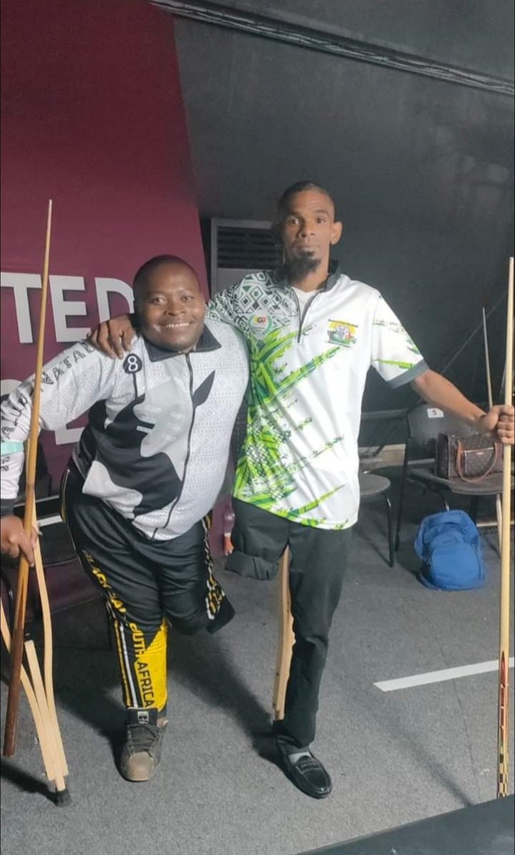 Disability 🎱 🇿🇦 Champ, my cousin on the right