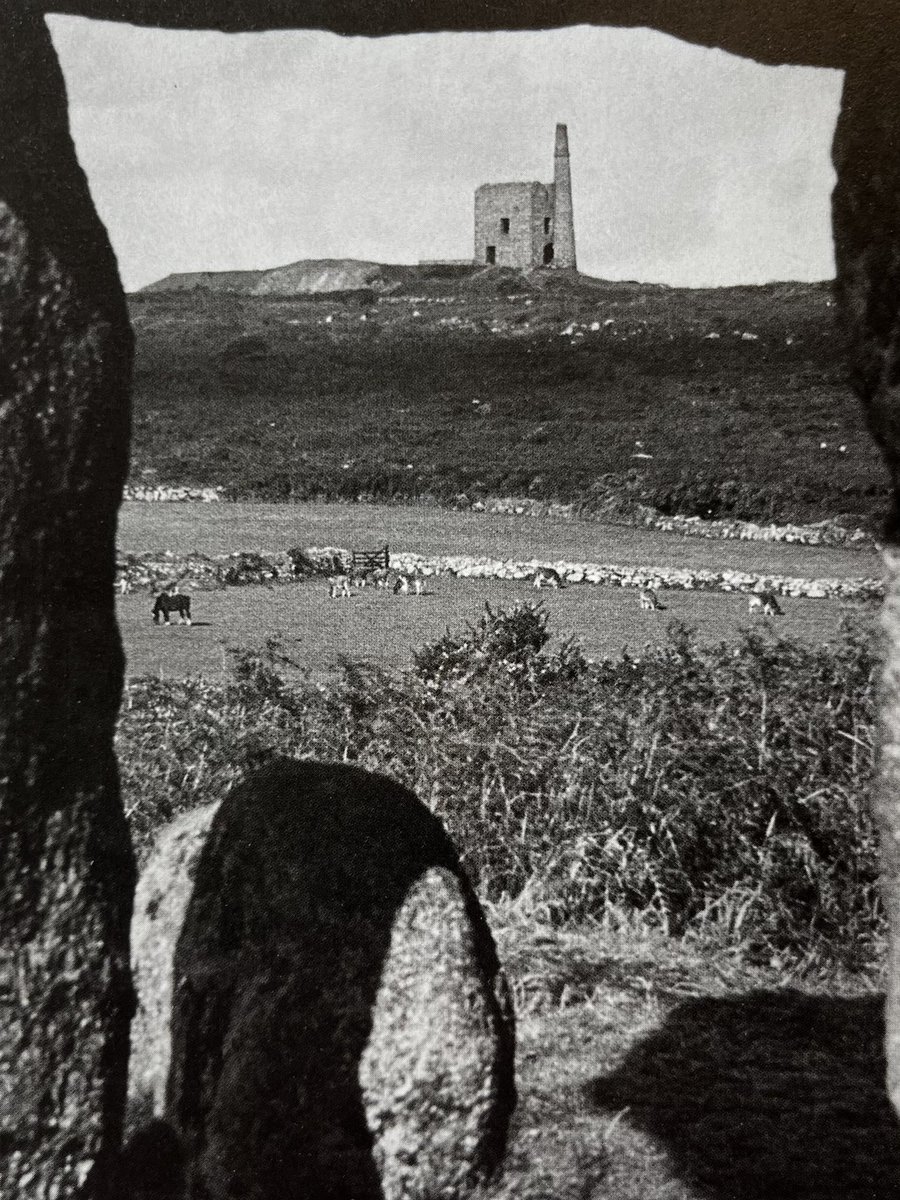 Paul Feiler's photograph of Greenburrow engine house at Ding Dong mines, seen through the standing stones of Lanyon Quoit.