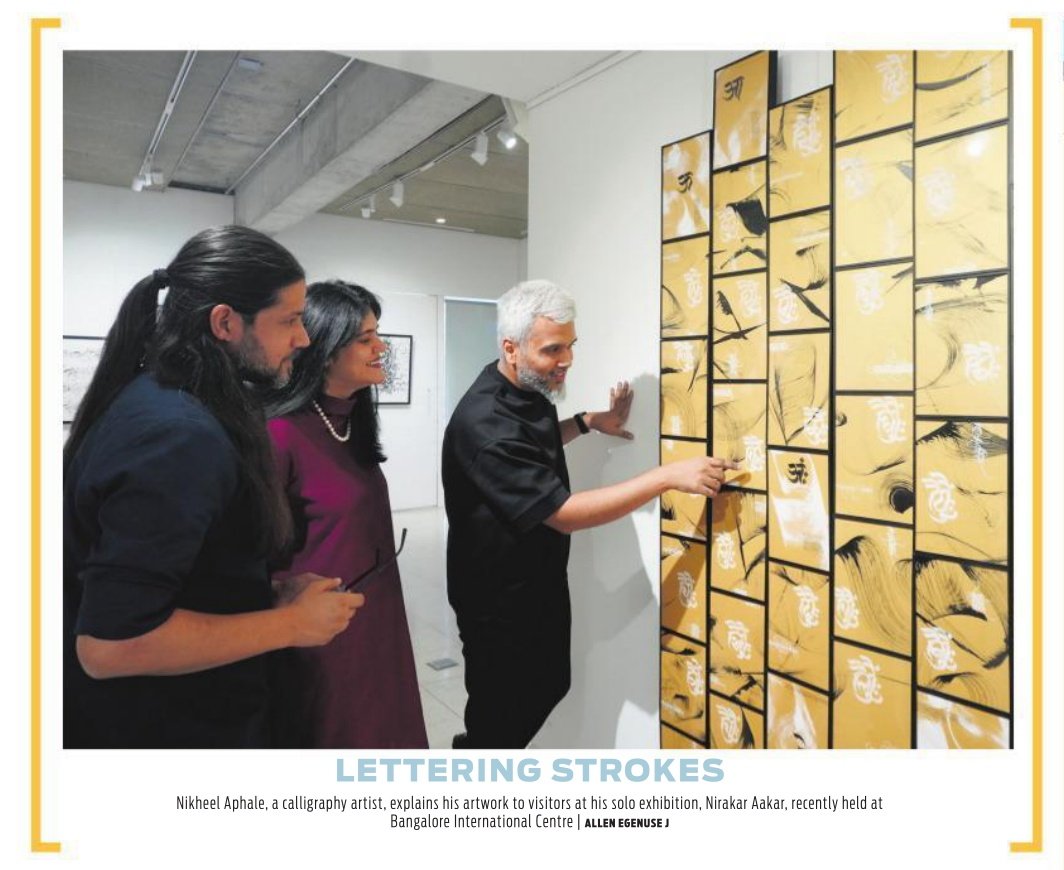 LETTERING STROKES : @anikheel , a #calligraphy artist, explains his artwork to visitors at his solo exhibition. Nirakar Aakar, recently held at #Bangalore International Centre @NewIndianXpress @XpressBengaluru