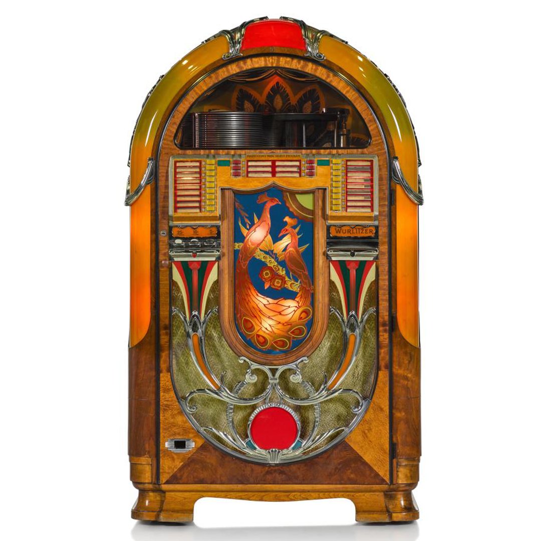 #DesignOfTheWeek | Step back in time with the Wurlitzer Peacock 850 jukebox 🦚 🎶

Once the jukebox of its decade, this 1941 design was created by Paul Fuller, who was well-known for his unique jukebox designs for the Wurlitzer Company. By the second half of the 1940s, the name…