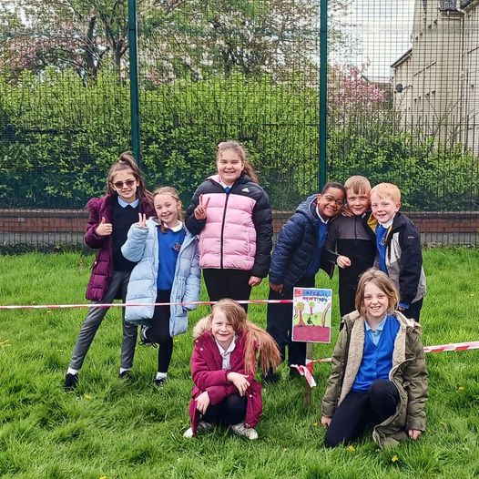We were out with Niddriemill pupils today putting up posters they have made to remind others to take care of the little trees we planted last month. The trees are looking good.