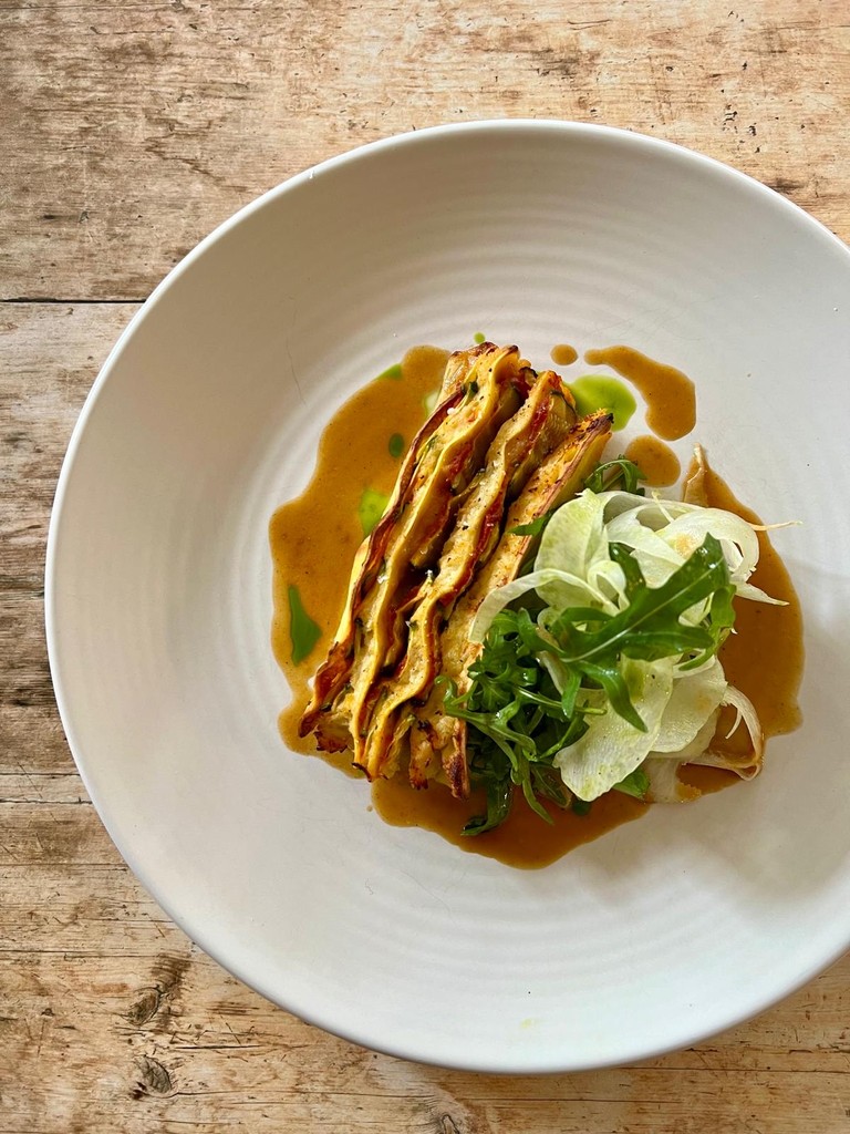 New for May Lasagne of crab, courgette & tomato, shaved fennel & rocket Book now via the link in our bio